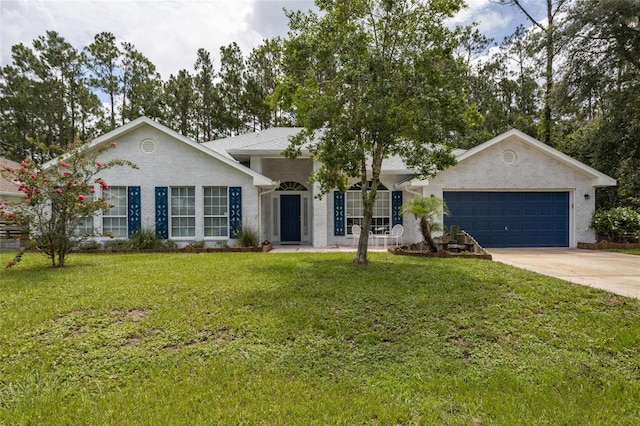 32 Karas Trl, Palm Coast, FL 32164 - single story home featuring a garage, brick siding, driveway, and a front lawn