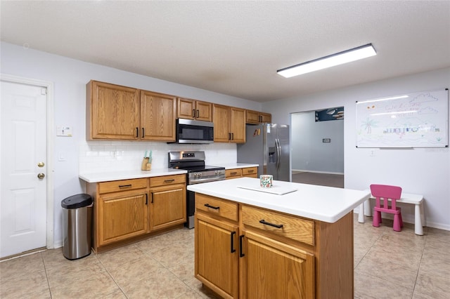 32 Karas Trl, Palm Coast, FL 32164 - kitchen featuring appliances with stainless steel finishes, decorative backsplash, light countertops, and brown cabinetry