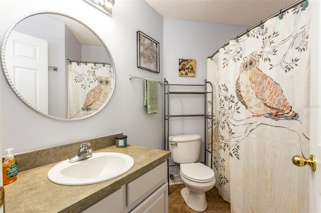 32 Karas Trl, Palm Coast, FL 32164 - bathroom featuring vanity, tile patterned flooring, and a textured ceiling