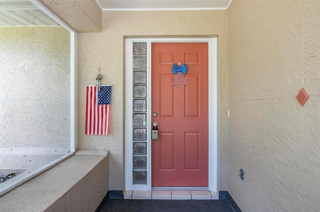 5 Wilksboro Pl, Palm Coast, FL 32164 - doorway to property with stucco siding