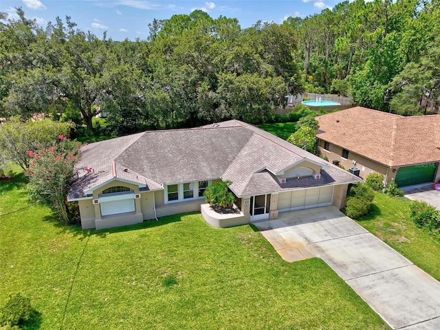 5 Wilksboro Pl, Palm Coast, FL 32164 - view from above of property with a heavily wooded area