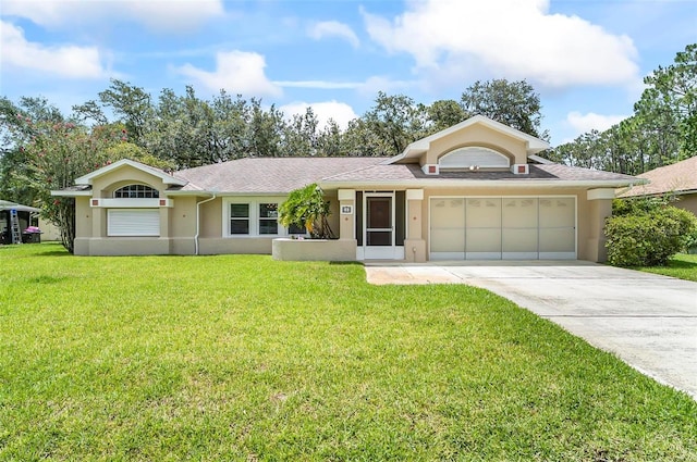 5 Wilksboro Pl, Palm Coast, FL 32164 - view of front of home featuring an attached garage, driveway, a front yard, stucco siding, and roof with shingles