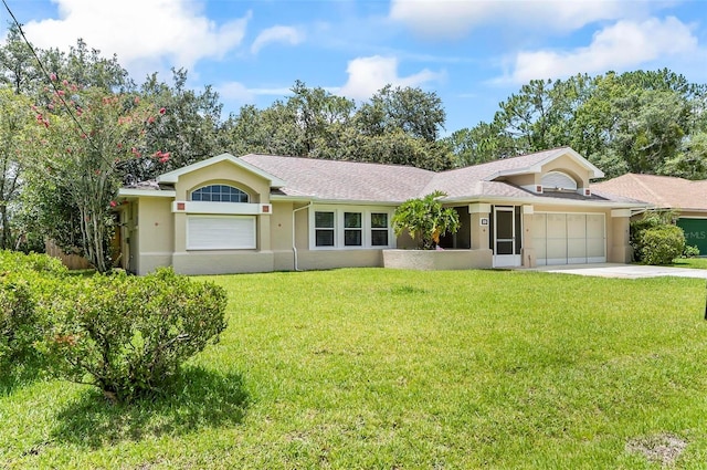 5 Wilksboro Pl, Palm Coast, FL 32164 - single story home featuring an attached garage, a front yard, stucco siding, concrete driveway, and roof with shingles