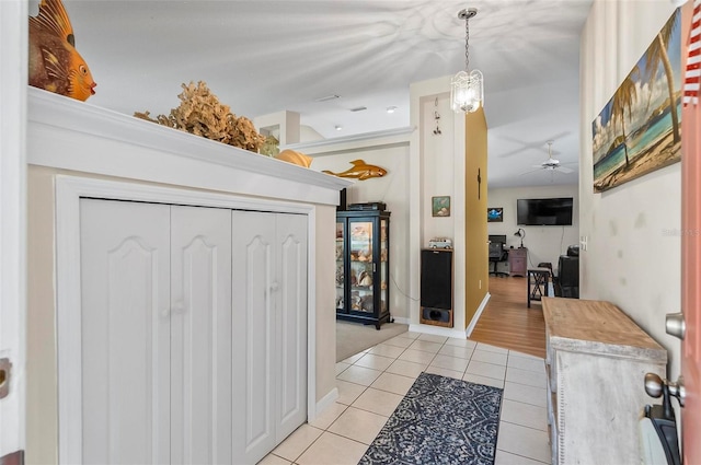 5 Wilksboro Pl, Palm Coast, FL 32164 - hall featuring light tile patterned flooring and baseboards