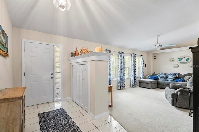 5 Wilksboro Pl, Palm Coast, FL 32164 - entryway featuring light tile patterned floors, a ceiling fan, and light carpet