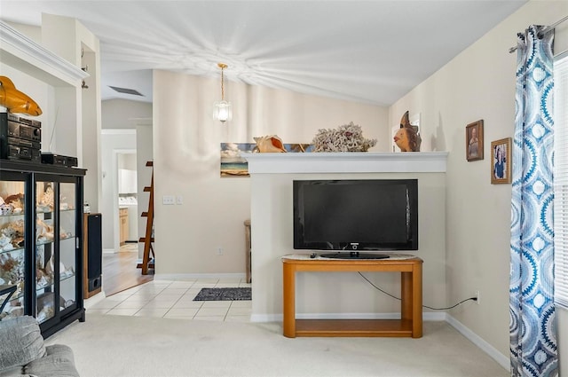5 Wilksboro Pl, Palm Coast, FL 32164 - carpeted living room with tile patterned flooring
