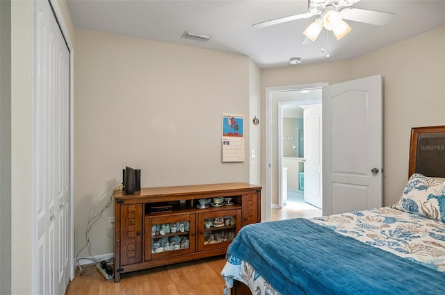 5 Wilksboro Pl, Palm Coast, FL 32164 - bedroom featuring light wood-type flooring, a ceiling fan, and a closet
