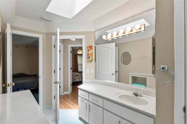 5 Wilksboro Pl, Palm Coast, FL 32164 - ensuite bathroom featuring a skylight and vanity