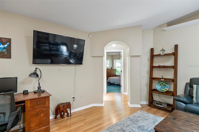 5 Wilksboro Pl, Palm Coast, FL 32164 - office space featuring light wood-style flooring and arched walkways