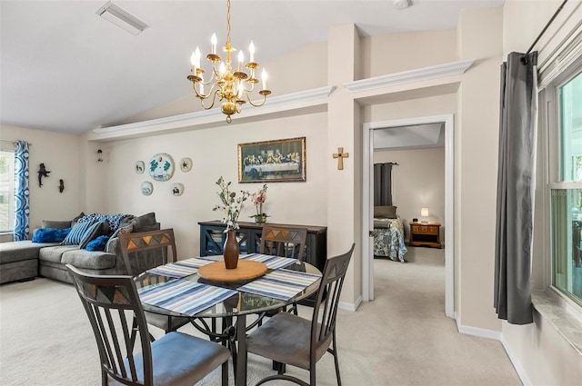 5 Wilksboro Pl, Palm Coast, FL 32164 - dining room with light carpet, vaulted ceiling, and a chandelier