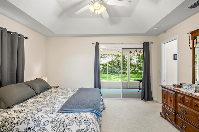 5 Wilksboro Pl, Palm Coast, FL 32164 - bedroom with access to outside, light carpet, ceiling fan, and a tray ceiling