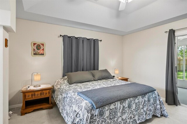 5 Wilksboro Pl, Palm Coast, FL 32164 - bedroom with light colored carpet and ceiling fan