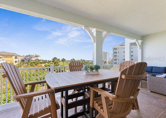 200 Cinnamon Beach Way Unit 131, Palm Coast, FL 32137 - view of patio featuring outdoor dining space