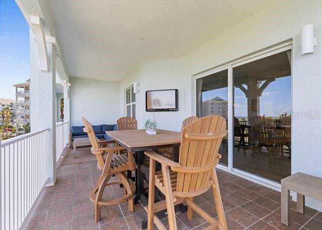 200 Cinnamon Beach Way Unit 131, Palm Coast, FL 32137 - patio / terrace featuring outdoor dining space