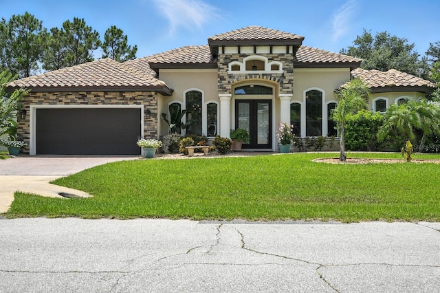 42 Felwood Ln, Palm Coast, FL 32137 - mediterranean / spanish house featuring french doors, a tiled roof, stucco siding, and a front lawn
