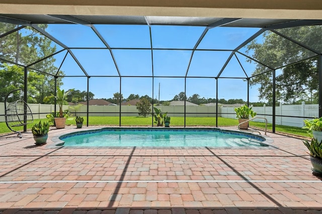 42 Felwood Ln, Palm Coast, FL 32137 - view of swimming pool featuring a patio area and glass enclosure