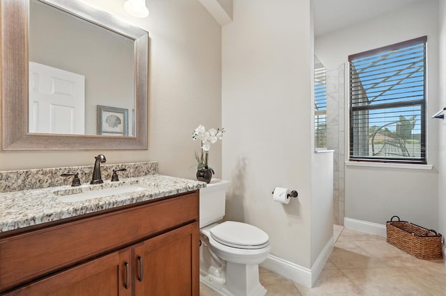42 Felwood Ln, Palm Coast, FL 32137 - full bath featuring vanity, tile patterned floors, and a tile shower