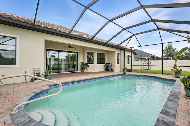 42 Felwood Ln, Palm Coast, FL 32137 - view of pool featuring a patio, ceiling fan, grilling area, and glass enclosure