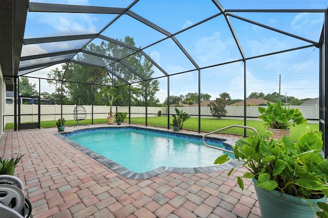 42 Felwood Ln, Palm Coast, FL 32137 - view of pool with a patio area, a fenced backyard, and a lanai
