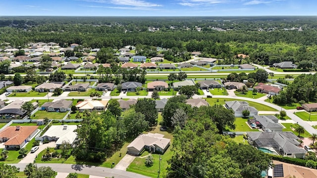 42 Felwood Ln, Palm Coast, FL 32137 - aerial perspective of suburban area featuring a heavily wooded area