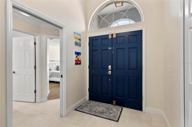 12 Comet Ct, Palm Coast, FL 32137 - foyer entrance featuring baseboards and light tile patterned flooring