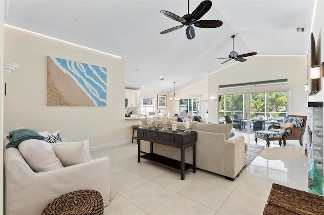 12 Comet Ct, Palm Coast, FL 32137 - living room featuring ceiling fan, light tile patterned floors, and high vaulted ceiling