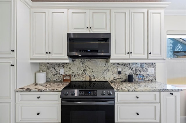 12 Comet Ct, Palm Coast, FL 32137 - kitchen featuring stainless steel electric stove, tasteful backsplash, and white cabinets