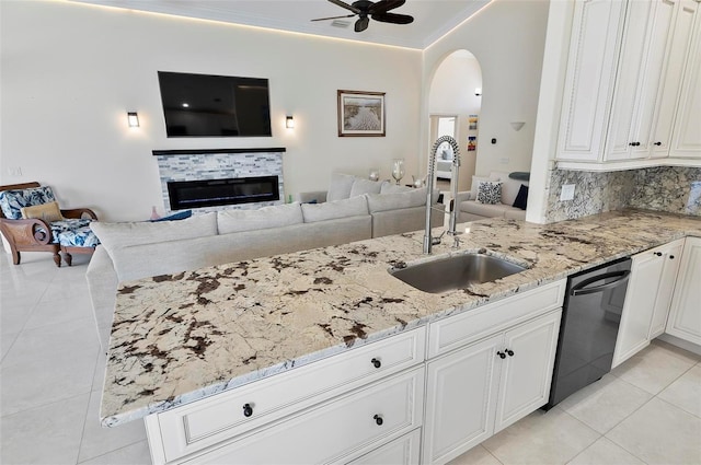 12 Comet Ct, Palm Coast, FL 32137 - kitchen featuring open floor plan, dishwasher, a ceiling fan, light tile patterned flooring, and ornamental molding