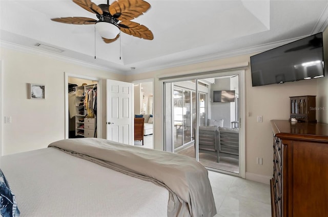 12 Comet Ct, Palm Coast, FL 32137 - bedroom with access to exterior, crown molding, a raised ceiling, a spacious closet, and light tile patterned floors