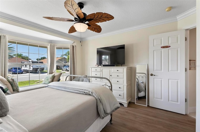 12 Comet Ct, Palm Coast, FL 32137 - bedroom with wood finished floors, ornamental molding, ceiling fan, and access to outside