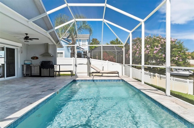 12 Comet Ct, Palm Coast, FL 32137 - view of swimming pool with a patio area, a fenced backyard, ceiling fan, and a lanai