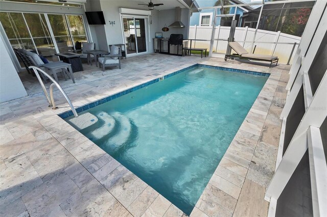 12 Comet Ct, Palm Coast, FL 32137 - view of pool with ceiling fan, a patio, and a lanai