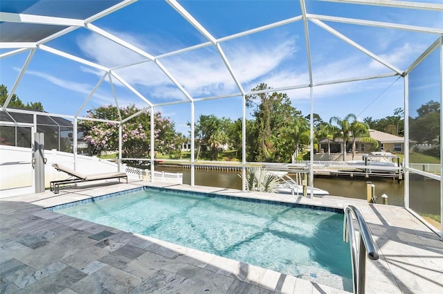 12 Comet Ct, Palm Coast, FL 32137 - outdoor pool featuring a water view, a dock, a patio, and a lanai