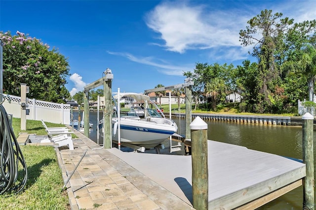 12 Comet Ct, Palm Coast, FL 32137 - dock featuring boat lift and a water view