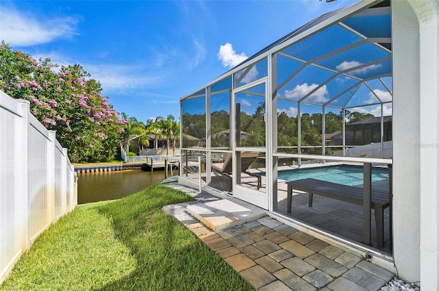 12 Comet Ct, Palm Coast, FL 32137 - outdoor pool with a water view, a patio, and a lanai
