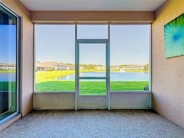 11781 Surfbird Cir Unit 6B, Jacksonville, FL 32256 - unfurnished sunroom featuring a water view