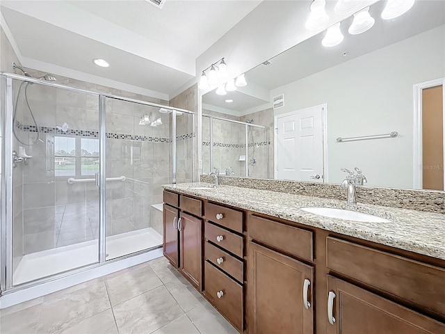 11781 Surfbird Cir Unit 6B, Jacksonville, FL 32256 - full bath featuring double vanity, a shower stall, and tile patterned floors
