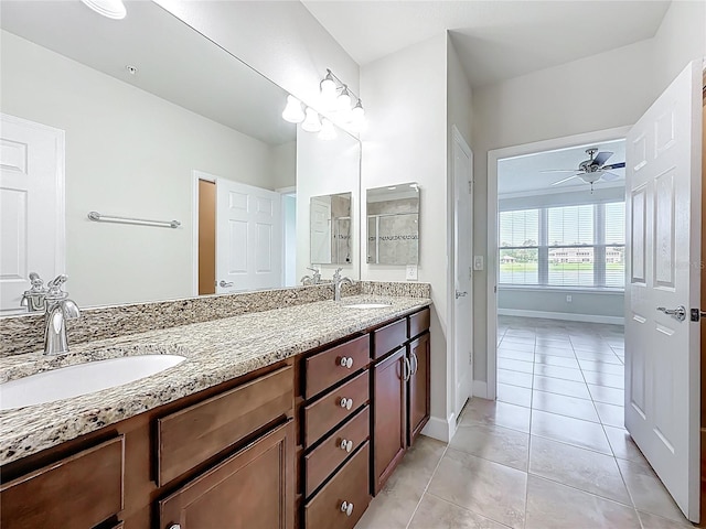 11781 Surfbird Cir Unit 6B, Jacksonville, FL 32256 - full bath with double vanity, tile patterned flooring, and a ceiling fan