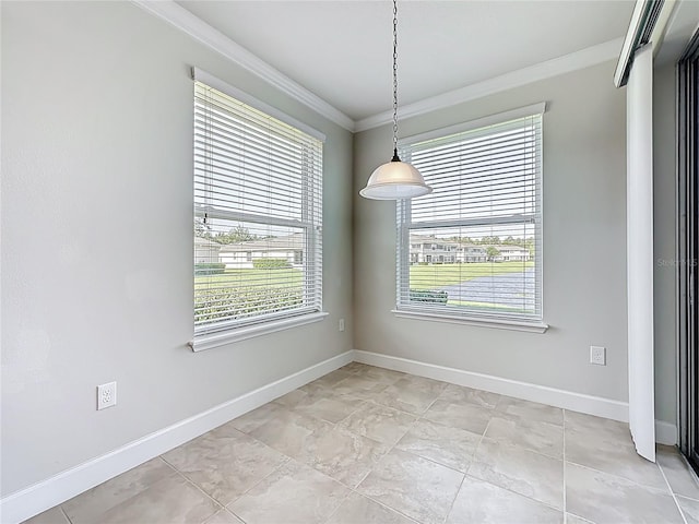 11781 Surfbird Cir Unit 6B, Jacksonville, FL 32256 - unfurnished dining area featuring crown molding and baseboards