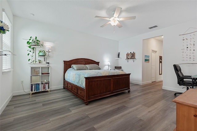 7 Pine Bush Ln, Palm Coast, FL 32164 - bedroom featuring light wood-type flooring and a ceiling fan