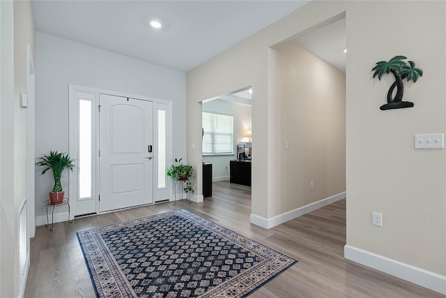 7 Pine Bush Ln, Palm Coast, FL 32164 - foyer entrance with wood finished floors and recessed lighting