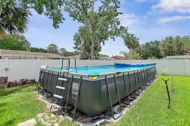 7 Pine Bush Ln, Palm Coast, FL 32164 - view of swimming pool with a fenced backyard