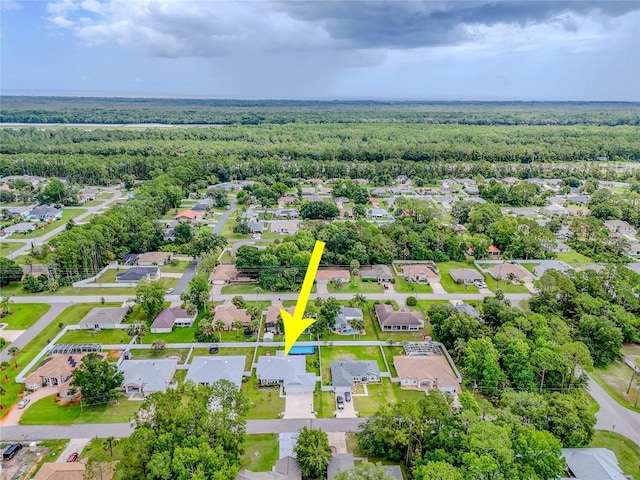 7 Pine Bush Ln, Palm Coast, FL 32164 - aerial view of residential area with a heavily wooded area