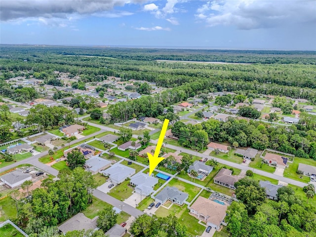 7 Pine Bush Ln, Palm Coast, FL 32164 - aerial overview of property's location with nearby suburban area