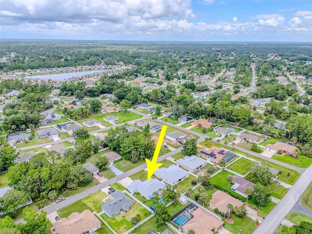 7 Pine Bush Ln, Palm Coast, FL 32164 - aerial view of property's location with a large body of water and nearby suburban area