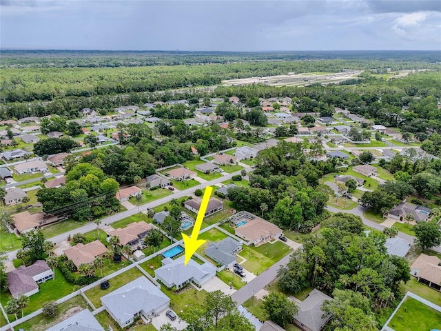 7 Pine Bush Ln, Palm Coast, FL 32164 - aerial perspective of suburban area featuring a heavily wooded area