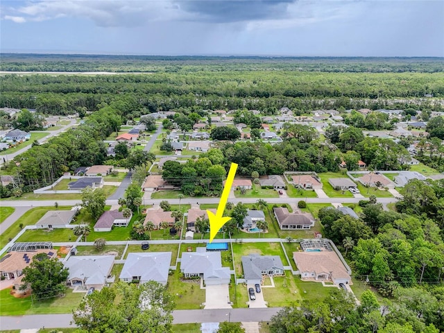 7 Pine Bush Ln, Palm Coast, FL 32164 - aerial view of residential area featuring a forest