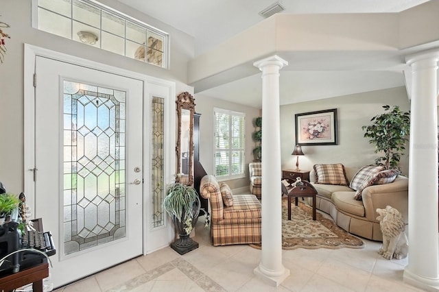67 Lagare St, Palm Coast, FL 32137 - entrance foyer with ornate columns and light tile patterned floors