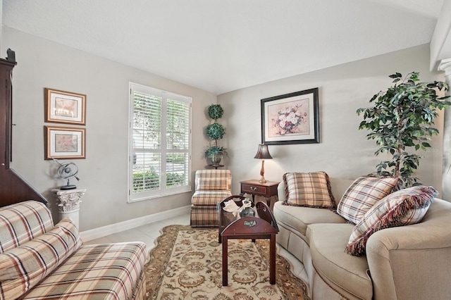 67 Lagare St, Palm Coast, FL 32137 - living area featuring baseboards and light tile patterned flooring