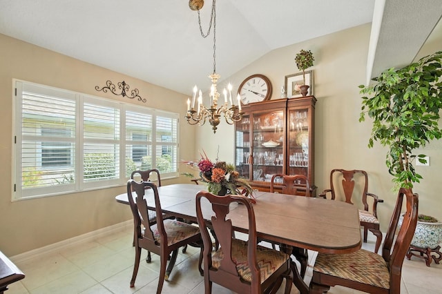 67 Lagare St, Palm Coast, FL 32137 - dining space with a chandelier, lofted ceiling, and light tile patterned flooring